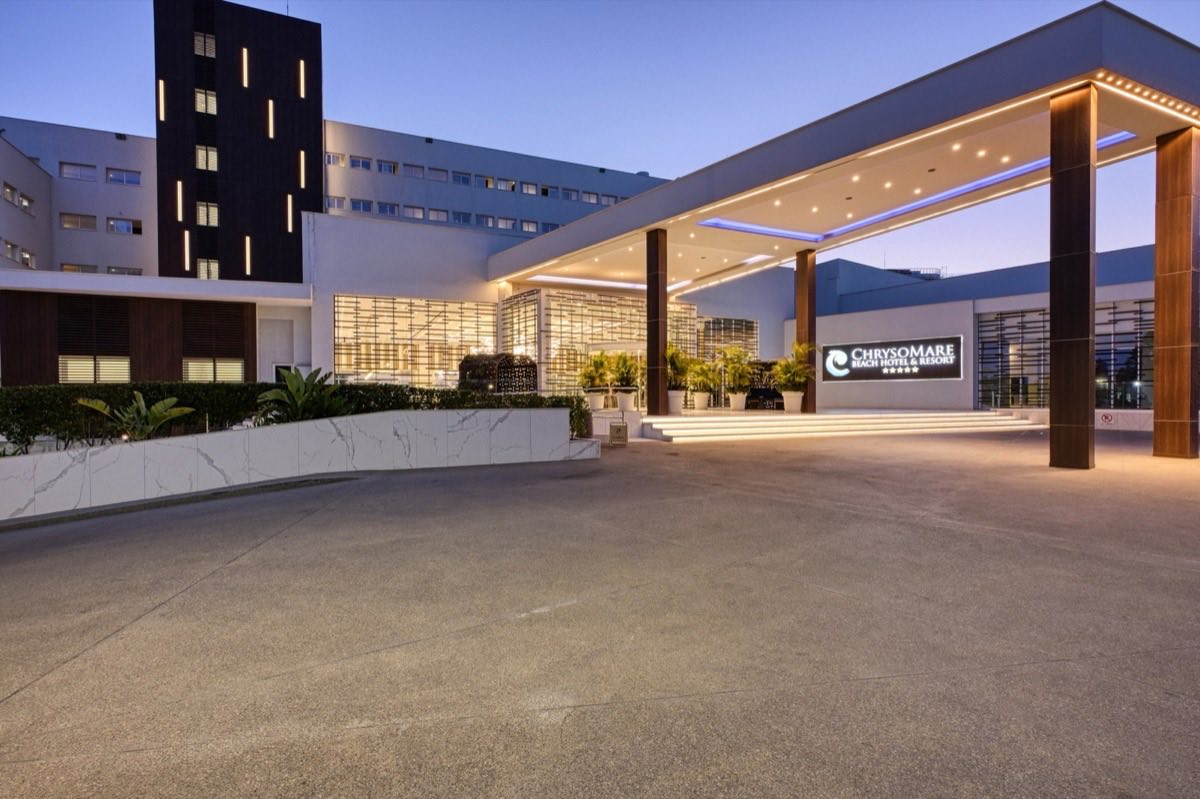 Constantinos the Great Beach Hotel entrance at dusk